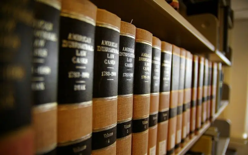 A row of law books on the shelf.